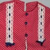 Completo rosso a pois bianchi con inserti ricamati