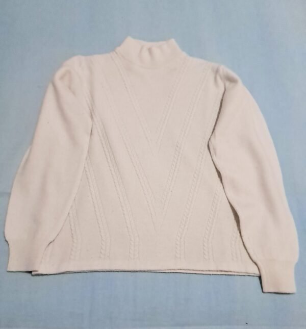 Lupetto color panna con trecce a "V"